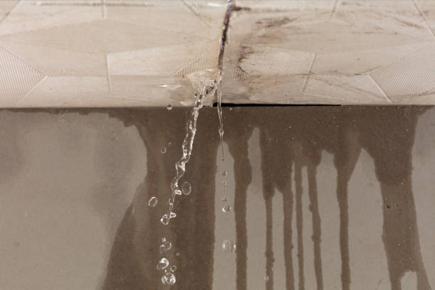 Professional Flood Damage Cleanup technician working in Centereach, NY